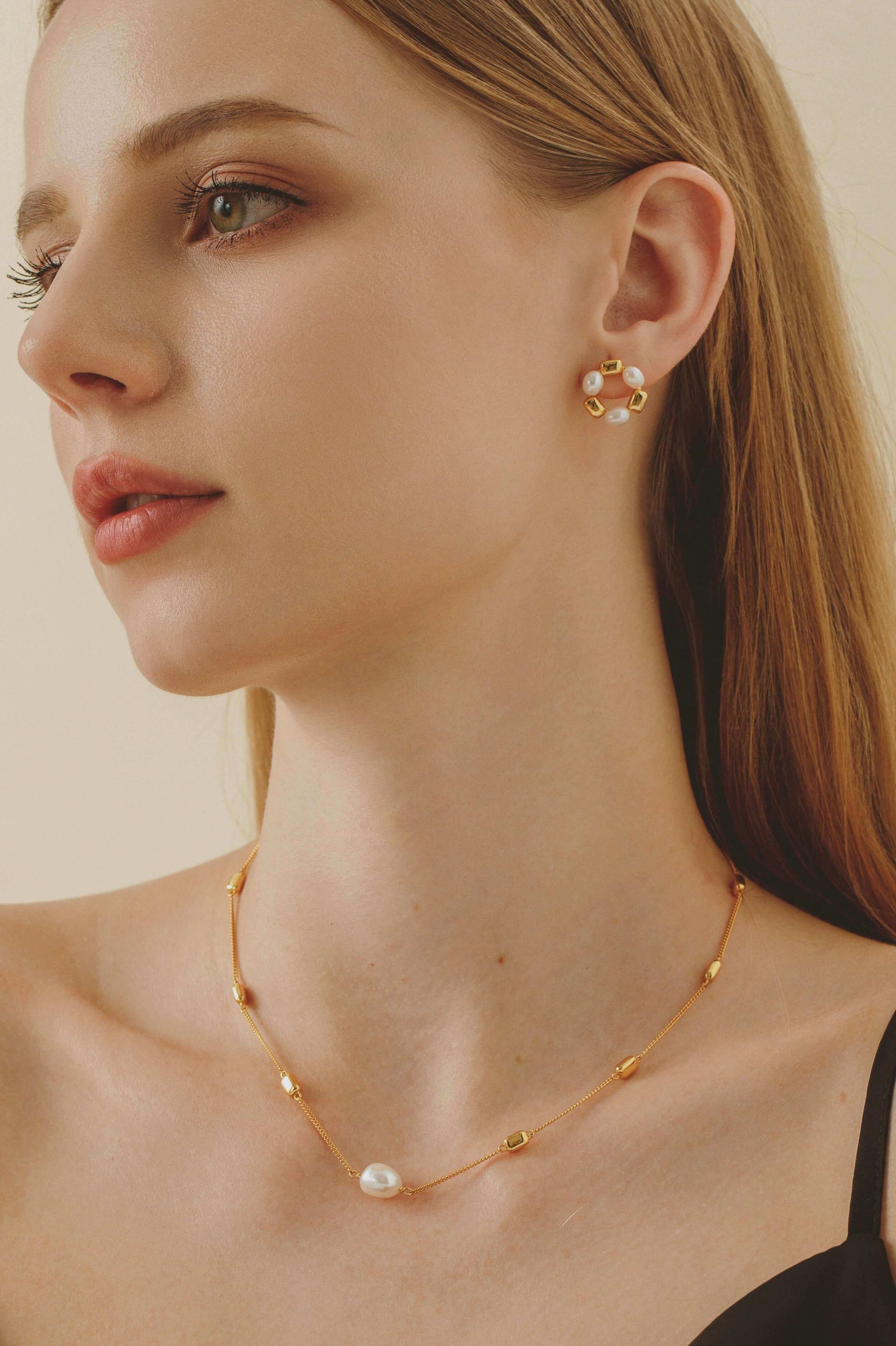 Alt Tag: Woman wearing SUIHE Jewelry 'Jellybean' Necklace with 18k gold vermeil and freshwater pearls for a sophisticated look.