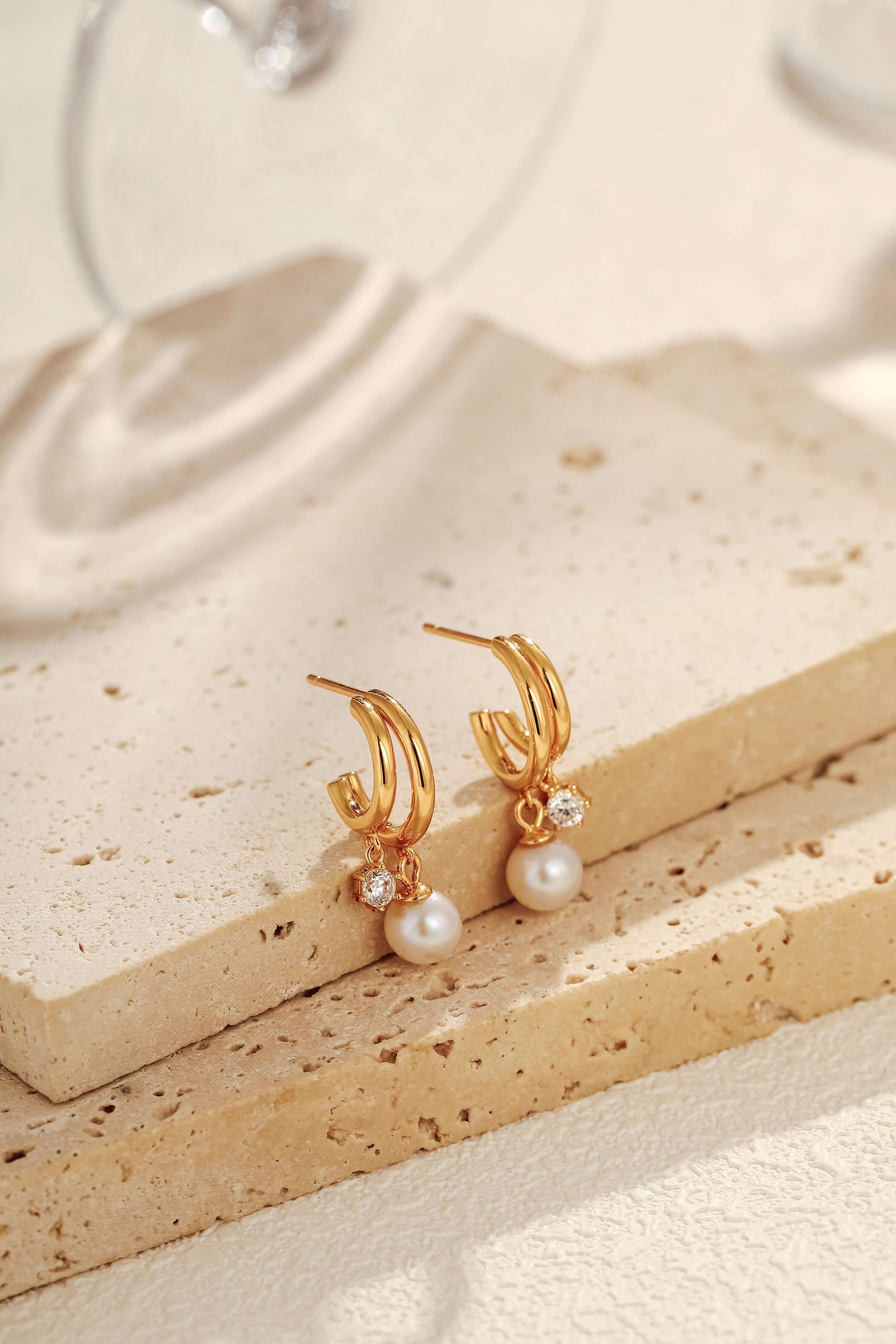 Allure Freshwater Pearl Earrings by SUIHE Jewelry, featuring 6-6.5mm pearls with zircon stones on 18k gold vermeil semi-circle design.