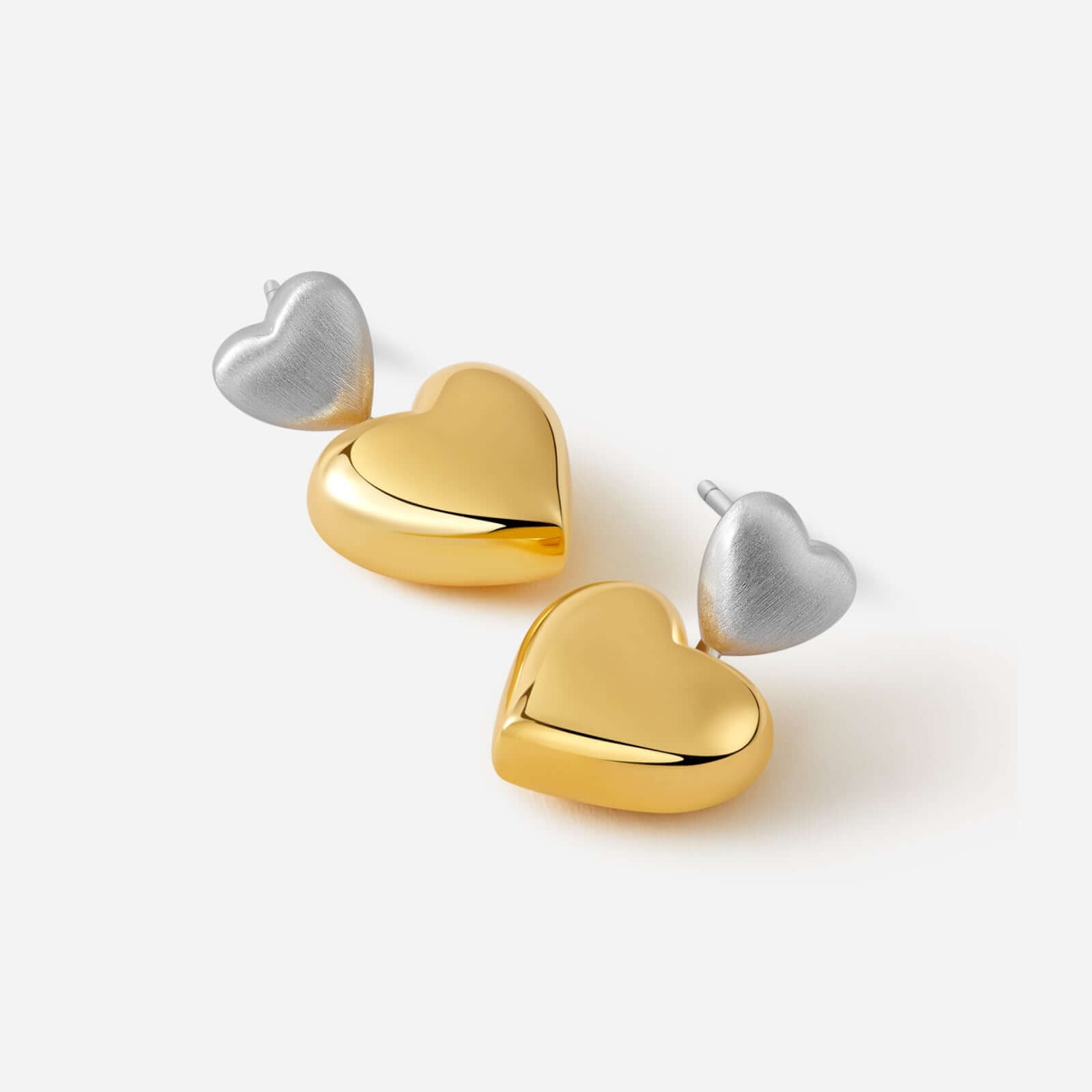 Amour Double Heart Earrings in brushed silver and polished gold by SUIHE Jewelry, showcasing elegance and sophistication for any occasion.