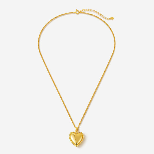 Gold-tone heart charm necklace with beaded detailing by SUIHE Jewelry, epitomizing love and elegance. Perfect romantic accessory.