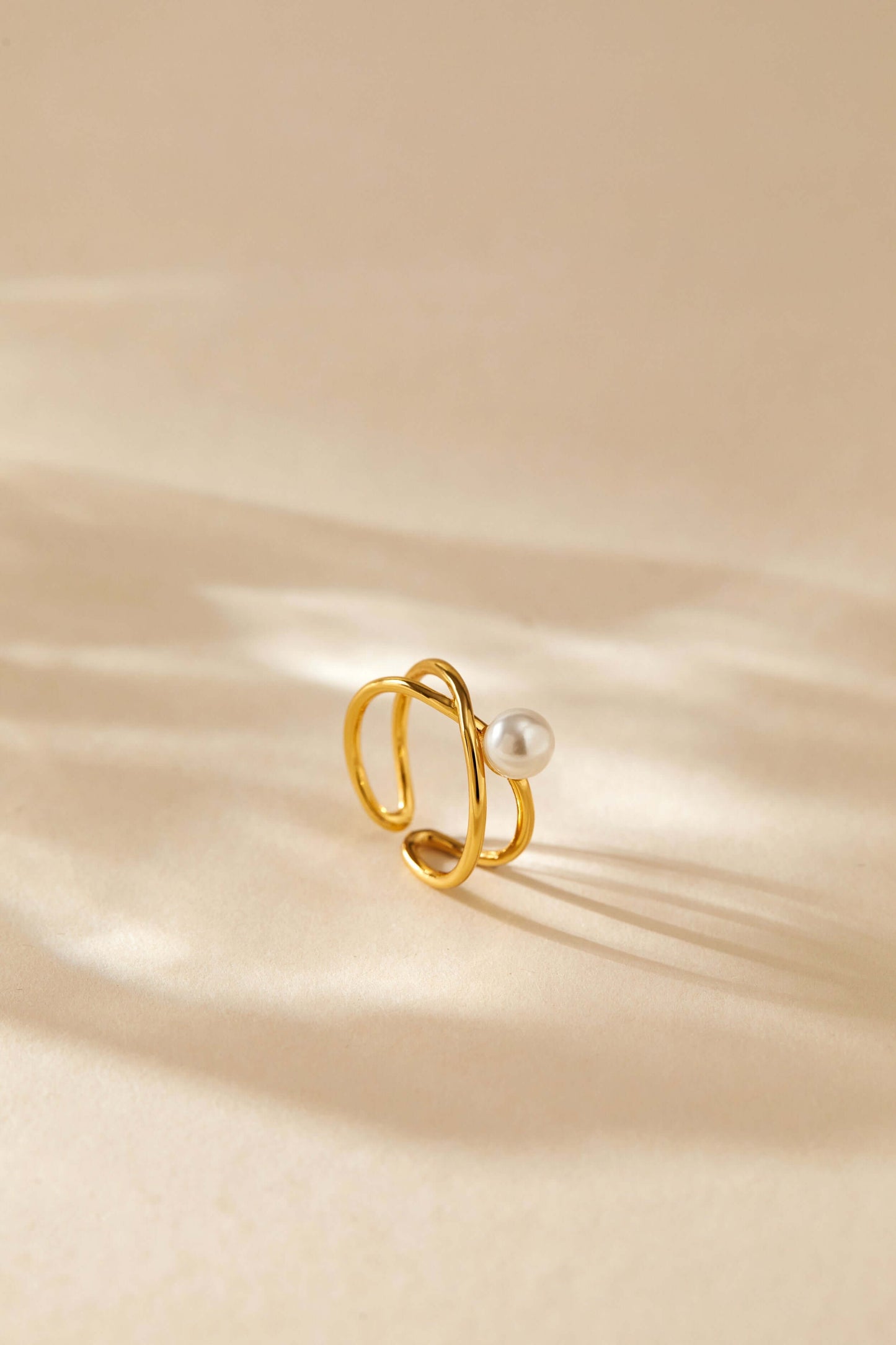 Wavelet Freshwater Pearl Ring by SUIHE Jewelry on gold-tone band, minimalist design, elegance and sophistication.