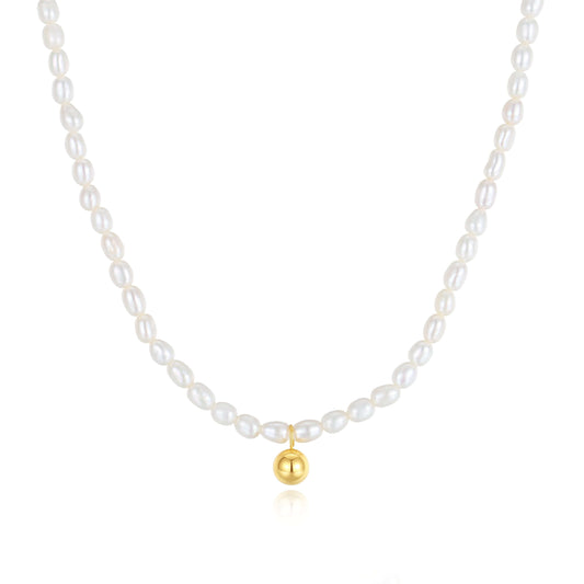 Celestia freshwater pearl necklace with 18k gold vermeil pendant by SUIHE Jewelry. Features delicate 3-4mm pearls, 16" chain with extender.