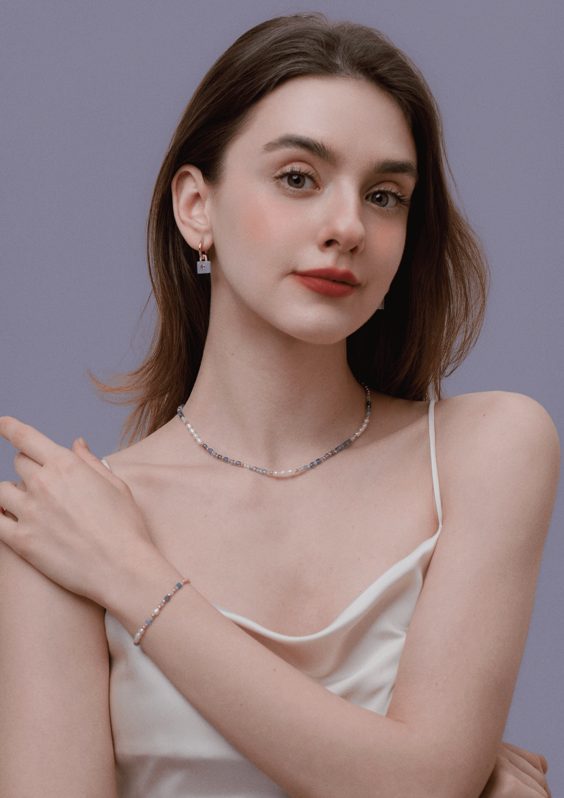 Woman wearing SUIHE Jewelry Ocean Natural Gemstone Necklace with pearls and gemstones, showing elegance and tranquility.