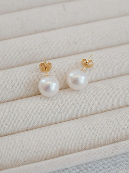 SUIHE Jewelry "Aurora" Akoya Pearl Stud Earrings in 18k Gold Vermeil on cream display