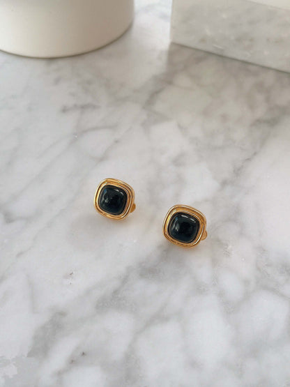 "Nocturne" Black Onyx Square Earrings by SUIHE Jewelry with 18k Gold Vermeil, elegant and bold design on marble surface