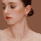 Woman wearing SUIHE Jewelry "Moon" Necklace and matching crescent moon earrings in gold plating, showcasing celestial elegance.