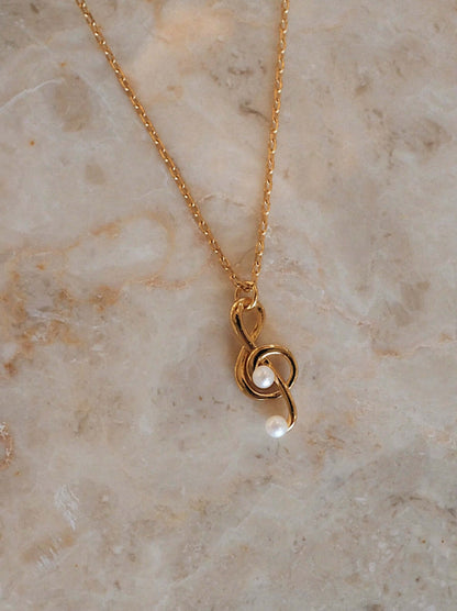 Aria necklace in 18k gold vermeil with music note charm by SUIHE Jewelry, luxurious and stylish addition to your collection.
