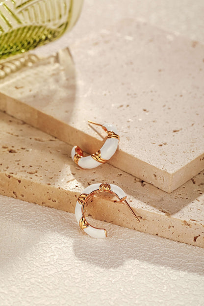 Luna white enamel hoop earrings on stone with 18k gold vermeil, capturing lunar elegance. SUIHE Jewelry.
