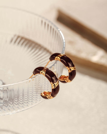 SUIHE Jewelry Mocha Hoop Earrings with gold vermeil half-moon design and yellow enamel on glass, evoking luxury and earthy tones.
