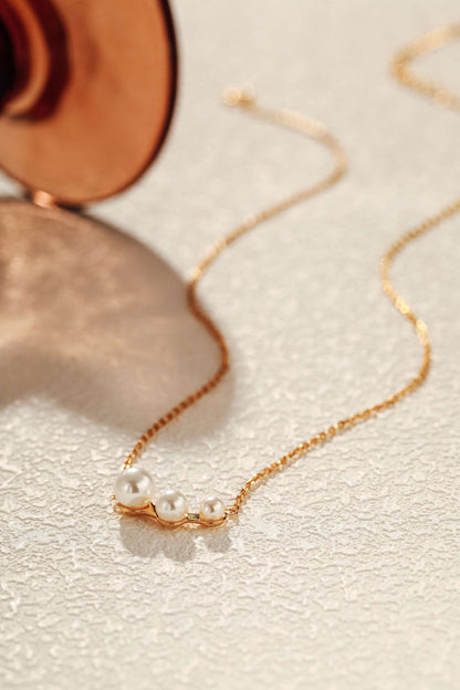 Flare Freshwater Pearl Necklace by SUIHE Jewelry with lustrous pearls on an 18k Gold Vermeil chain, blending nature and elegance.
