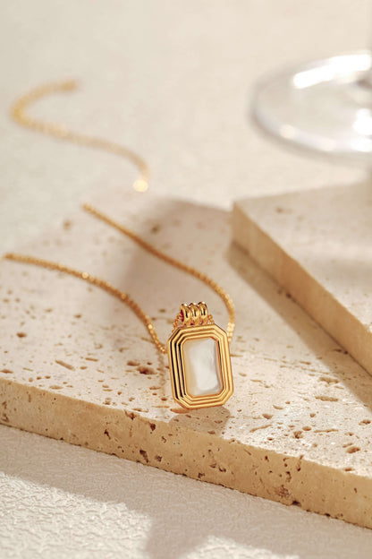 Radiance mother-of-pearl rectangle necklace on gold chain, SUIHE Jewelry, elegant 18k gold vermeil setting, serene and luxurious gift.
