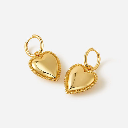 Gold-tone heart charm hoop earrings with beaded details by SUIHE Jewelry, adding elegance to any outfit.