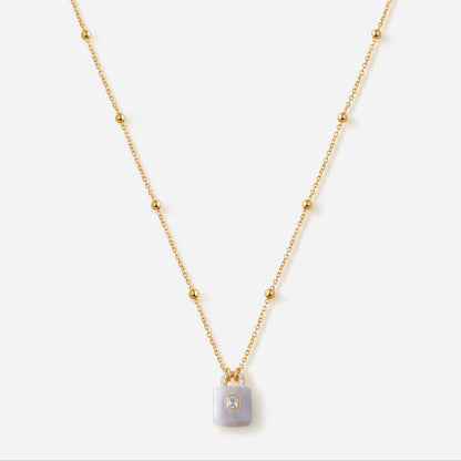 SUIHE Jewelry Lock Aquamarine Stone Necklace featuring a gold-plated chain with a blue aquamarine lock pendant and zircon detail.