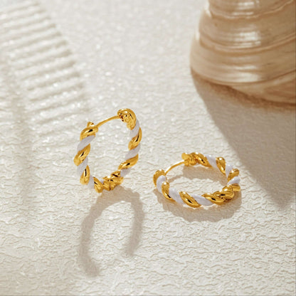 18K gold and white enamel dough twist hoop earrings by SUIHE Jewelry, showcasing elegant intertwined design on textured surface.
