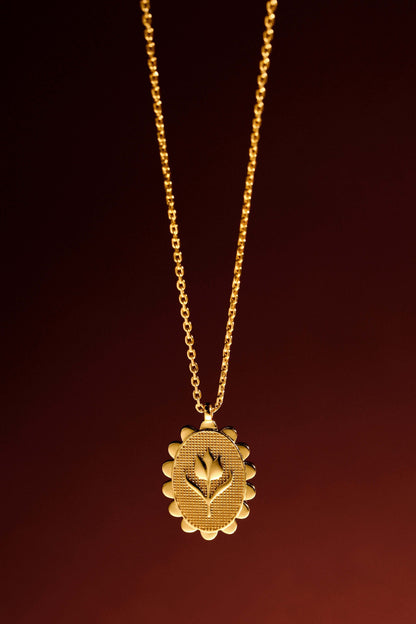 Elegant 'Golden Tulip' Necklace by SUIHE Jewelry, featuring tulip-inspired charm, crafted in 18k Gold Vermeil on a dark background.