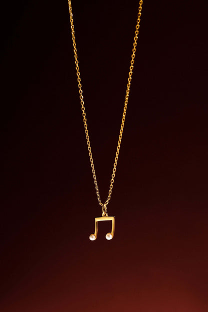 "Melody" Necklace in 18k Gold Vermeil with Pearls by SUIHE Jewelry, showcasing elegant and timeless design on a dark background.