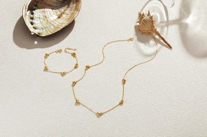 18k gold vermeil Croissant Mini Charm Necklace and bracelet by SUIHE Jewelry, showcasing French-inspired elegance and playful design.