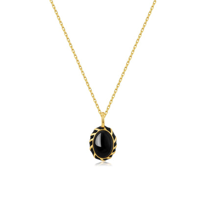 "Eclipse Necklace" with black onyx pendant, glossy enamel, on 40cm gold vermeil chain by SUIHE Jewelry, inspired by solar eclipse.