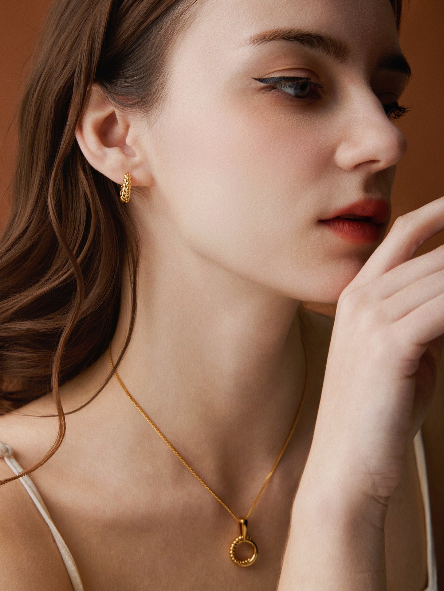 「Twist」mini hoop earrings