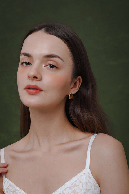 Woman wearing SUIHE Jewelry Amber Earrings with Tiger's Eye Stone and 18k Gold Vermeil, showcasing timeless elegance and versatility.