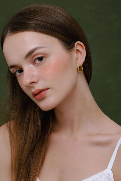 Woman wearing SUIHE Jewelry Tiger's Eye Stone earrings in 18k Gold Vermeil, showcasing timeless elegance and sophistication.